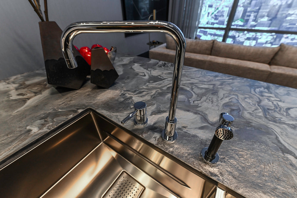 Modern White and Brown Wood Veneer Kitchen with Waterfall Island, Marble Countertops & Miele Appliances