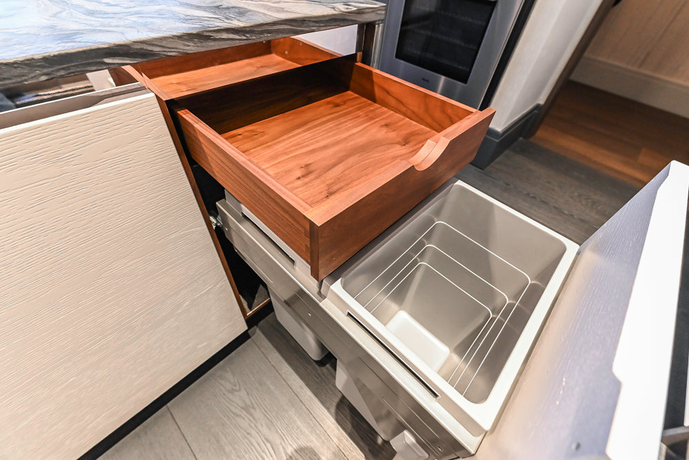 Modern White and Brown Wood Veneer Kitchen with Waterfall Island, Marble Countertops & Miele Appliances