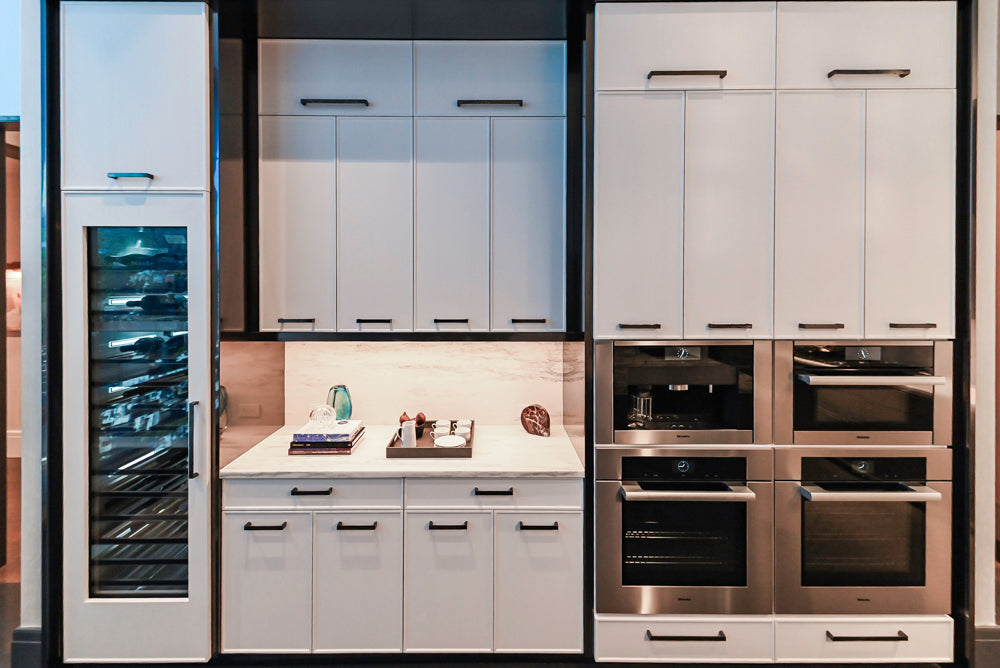 Transitional White Kitchen with Marble Countertops & Miele Appliances