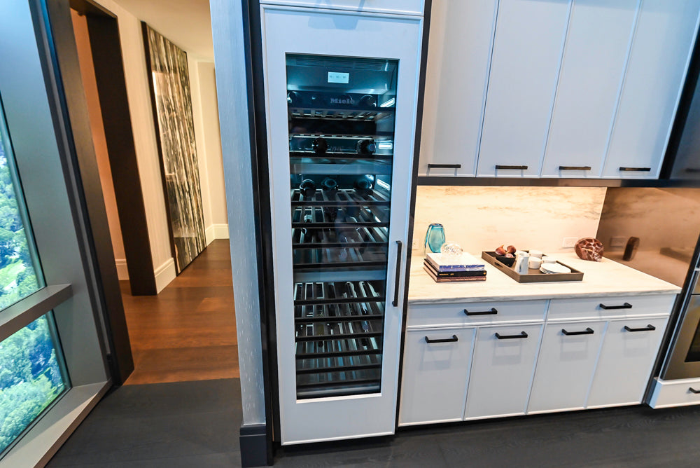 Transitional White Kitchen with Marble Countertops & Miele Appliances