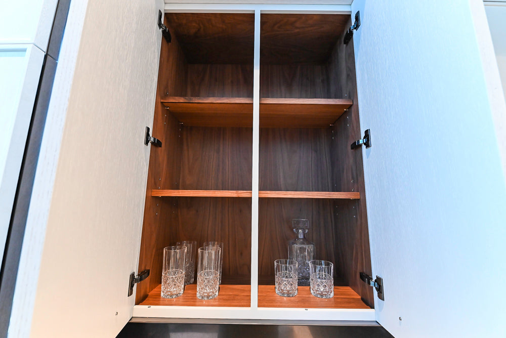 Transitional White Kitchen with Marble Countertops & Miele Appliances