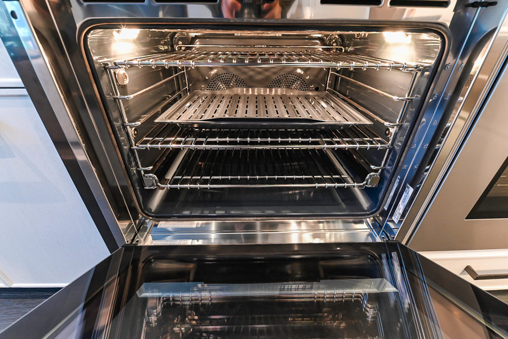 Transitional White Kitchen with Marble Countertops & Miele Appliances