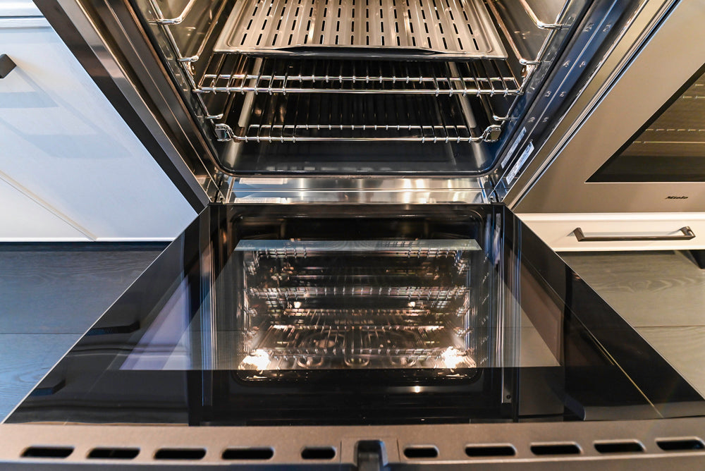 Transitional White Kitchen with Marble Countertops & Miele Appliances