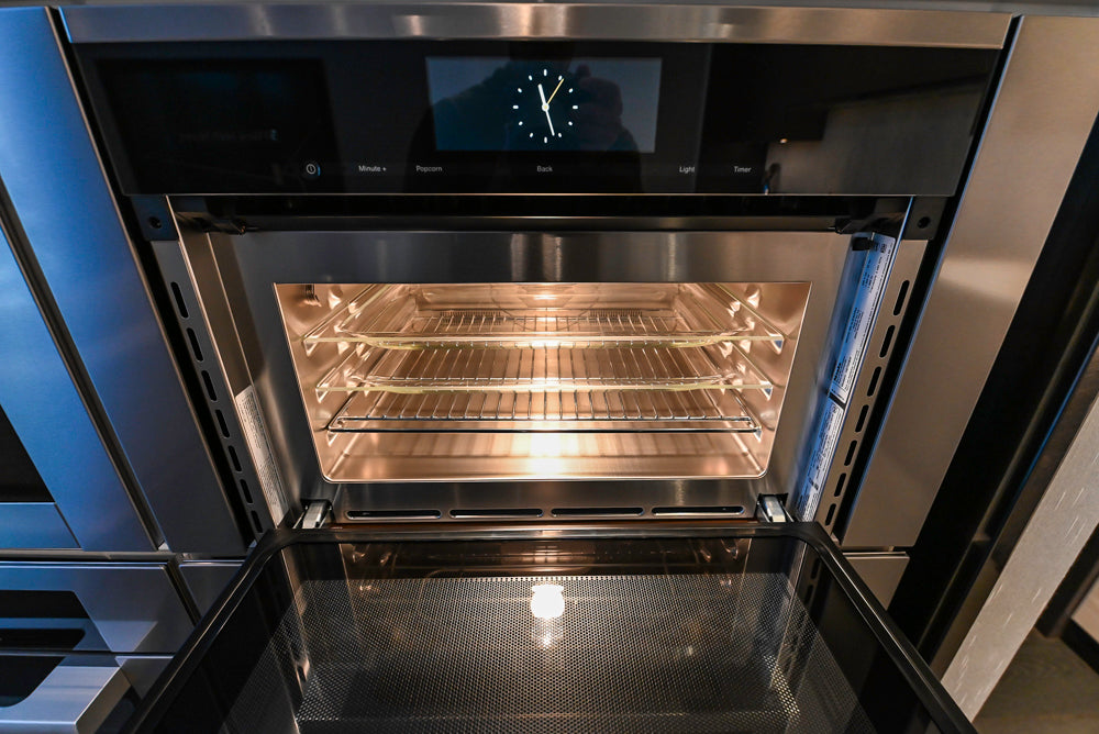 Transitional White Kitchen with Marble Countertops & Miele Appliances