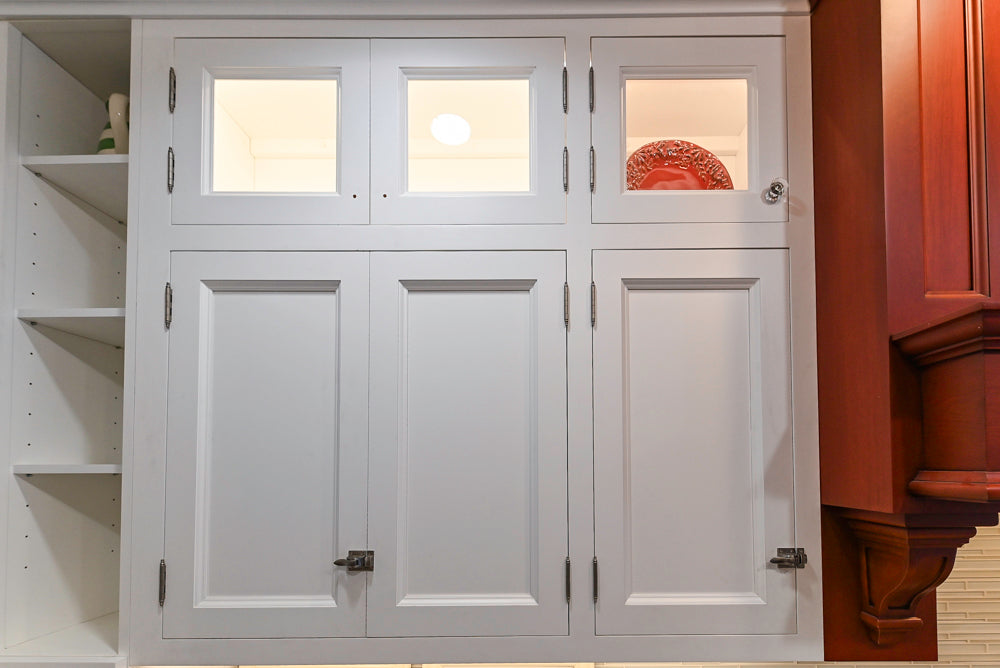 Amish Custom Cabinets with Mahogany Hood in Traditional Classic White Kitchen & Two-Toned Dry Bar