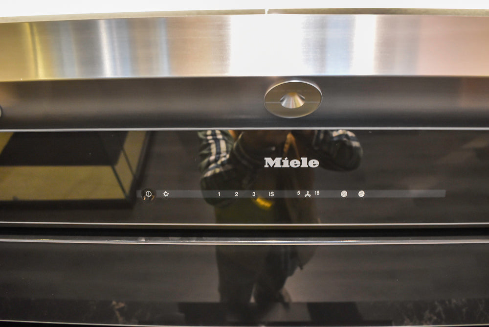 Poggenpohl Segmento Modern Black Kitchen with Miele Appliances