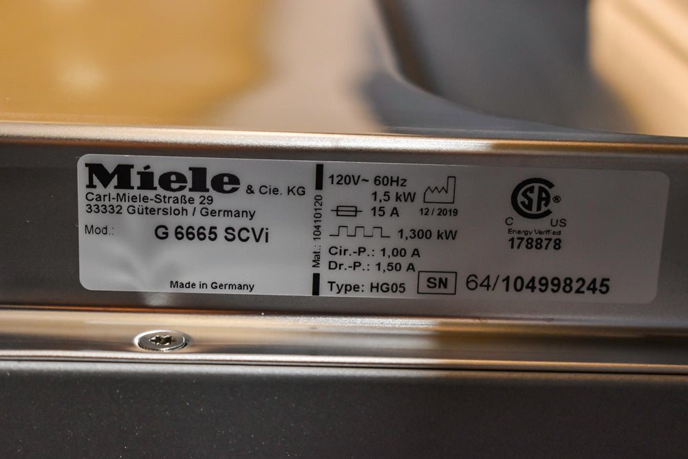 Poggenpohl Segmento Modern Black Kitchen with Miele Appliances