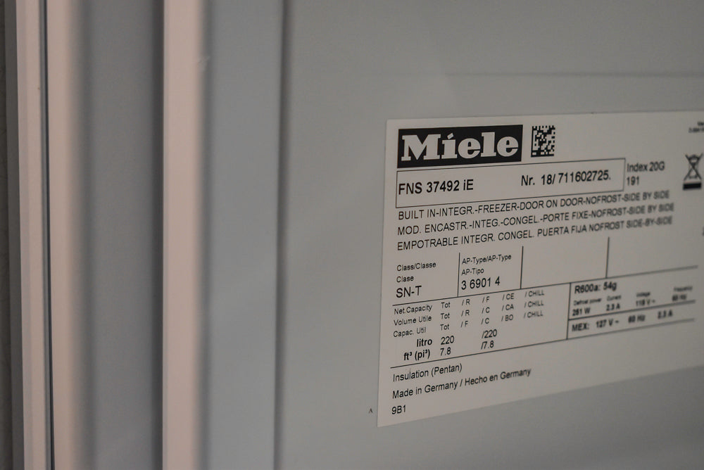 Poggenpohl Segmento Modern Black Kitchen with Miele Appliances