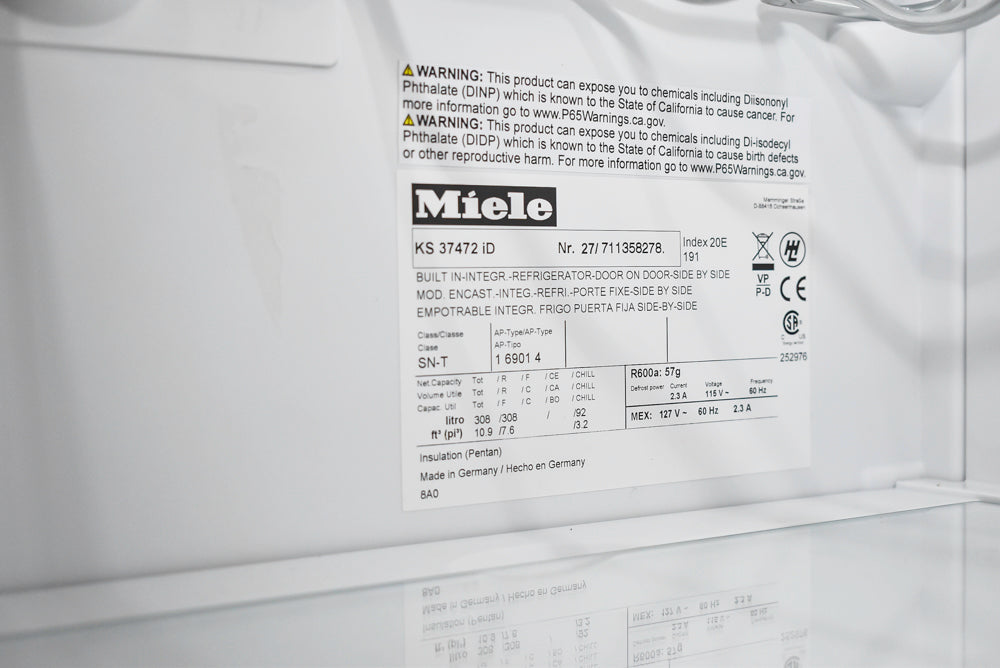 Poggenpohl Segmento Modern Black Kitchen with Miele Appliances