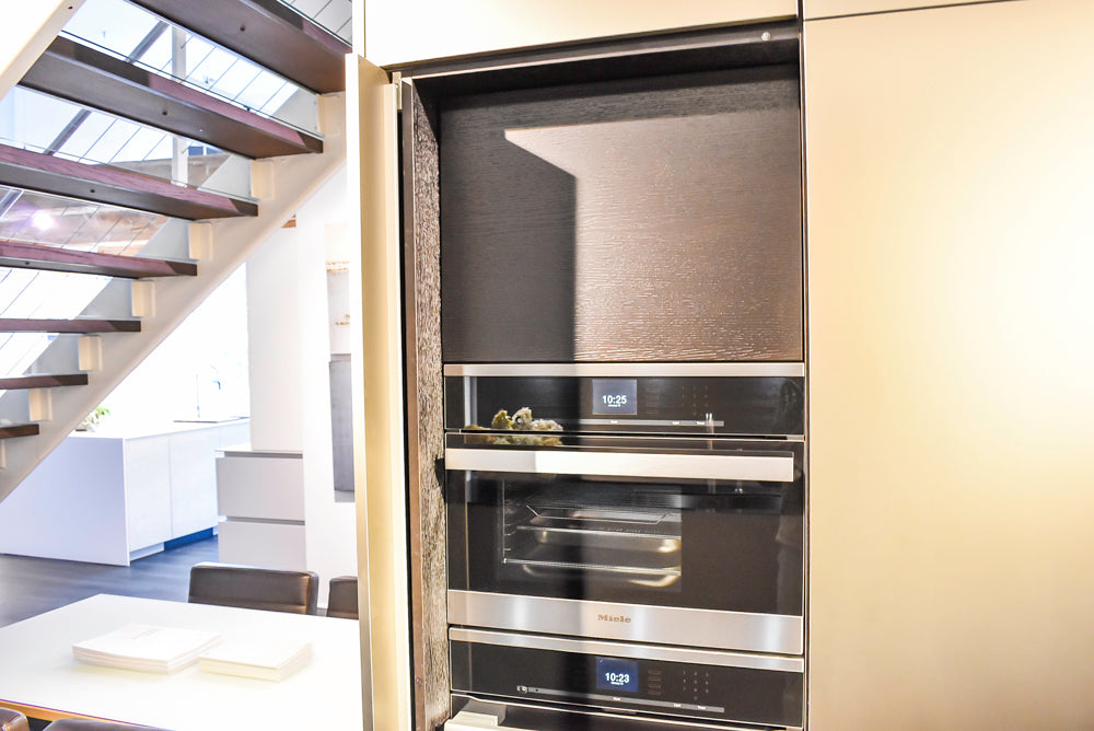 Poggenpohl Segmento Modern Black Kitchen with Miele Appliances