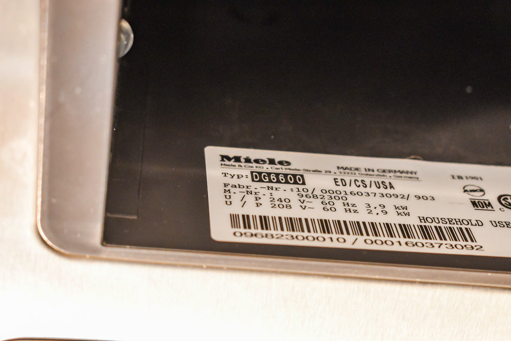 Poggenpohl Segmento Modern Black Kitchen with Miele Appliances