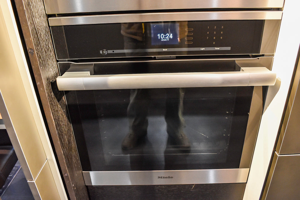 Poggenpohl Segmento Modern Black Kitchen with Miele Appliances