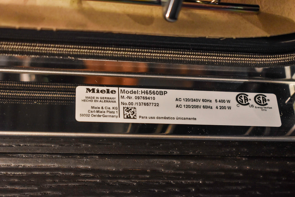 Poggenpohl Segmento Modern Black Kitchen with Miele Appliances