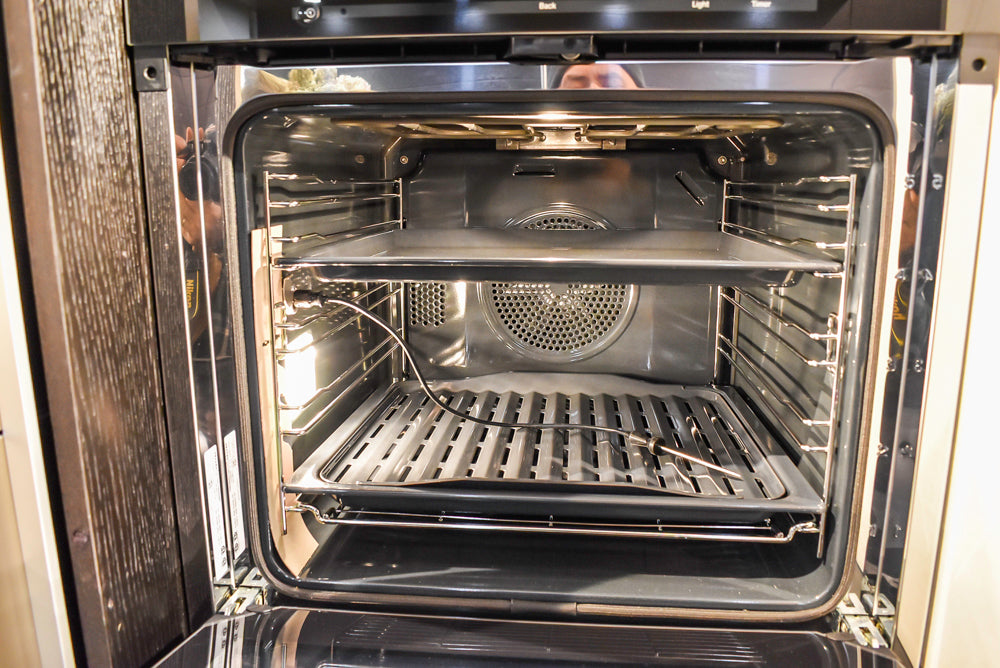 Poggenpohl Segmento Modern Black Kitchen with Miele Appliances