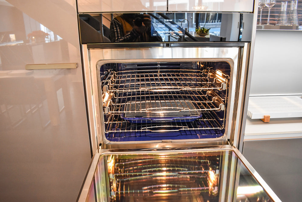 Poggenpohl Standard Modern Multi-Tone Kitchen with Glass Upper Cabinets and Sub-Zero & Wolf Appliances