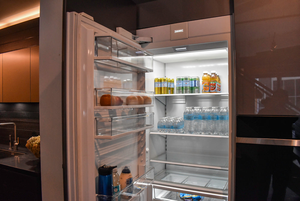 Poggenpohl Standard Modern Multi-Tone Kitchen with Glass Upper Cabinets and Sub-Zero & Wolf Appliances