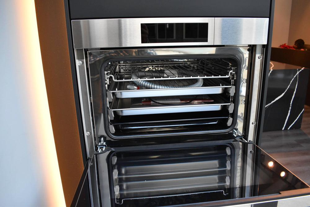 Poggenpohl Segmento Y Modern Black and White Kitchen with Wolf & Miele Appliances