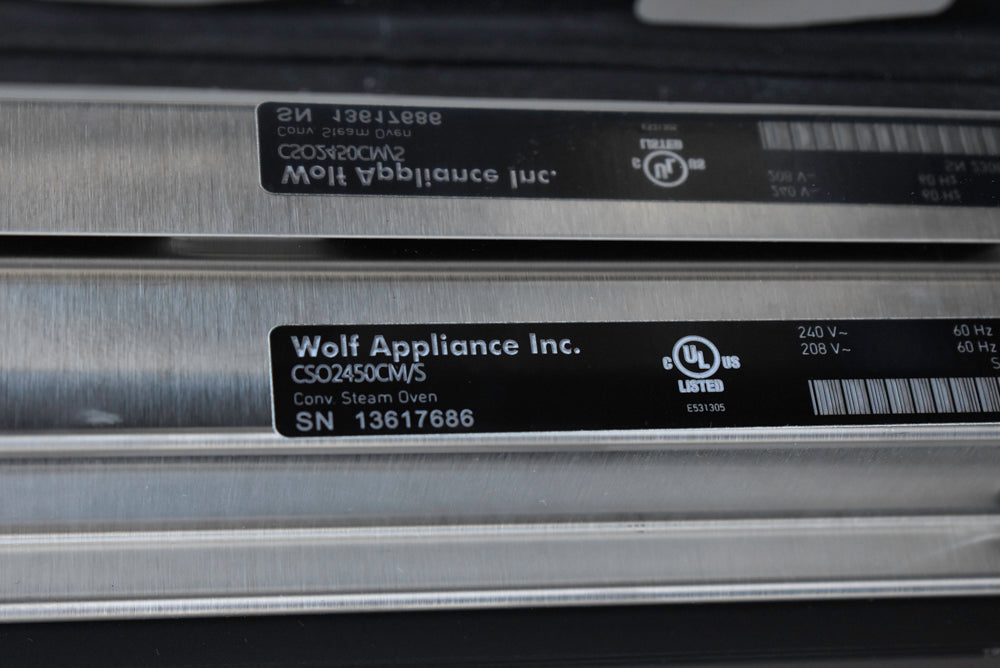 Poggenpohl Segmento Y Modern Black and White Kitchen with Wolf & Miele Appliances