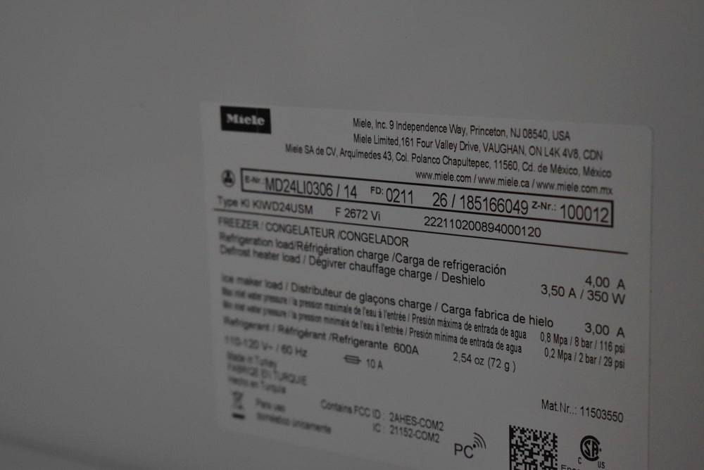 Poggenpohl Segmento Y Modern Black and White Kitchen with Wolf & Miele Appliances