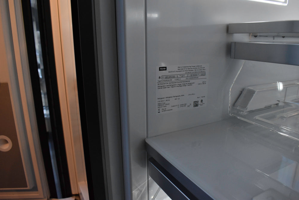 Poggenpohl Segmento Y Modern Black and White Kitchen with Wolf & Miele Appliances