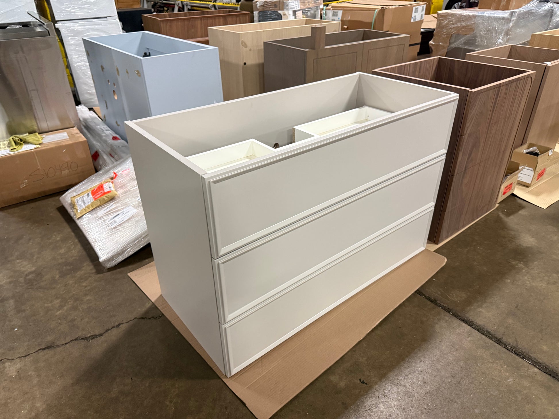 Top view of DOCA 47 inch off white vanity base showing open deck layout ready for custom stone countertop