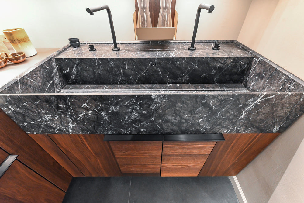 Cesar Modern Dark Wood Tone Kitchen with Black Wood Veneer Countertops and Custom Marble Sink