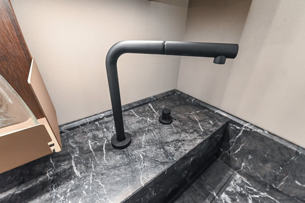 Cesar Modern Dark Wood Tone Kitchen with Black Wood Veneer Countertops and Custom Marble Sink