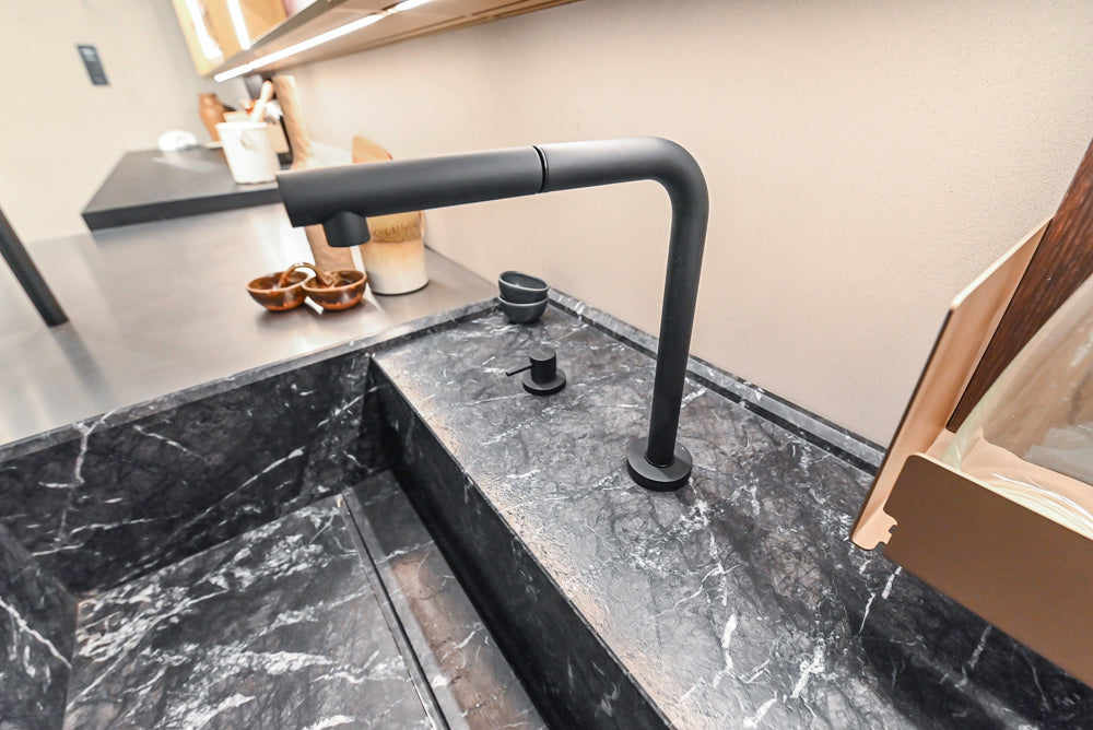 Cesar Modern Dark Wood Tone Kitchen with Black Wood Veneer Countertops and Custom Marble Sink