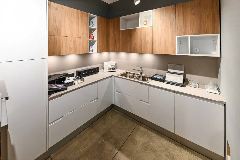 Lyon's Modern White and Natural Wood Toned Kitchenette with Silestone Countertops