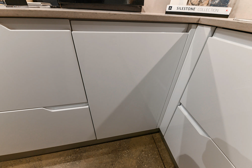 Lyon's Modern White and Natural Wood Toned Kitchenette with Silestone Countertops