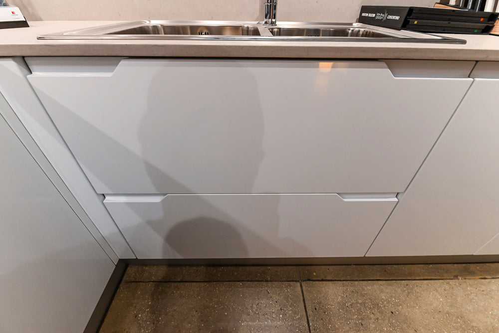 Lyon's Modern White and Natural Wood Toned Kitchenette with Silestone Countertops