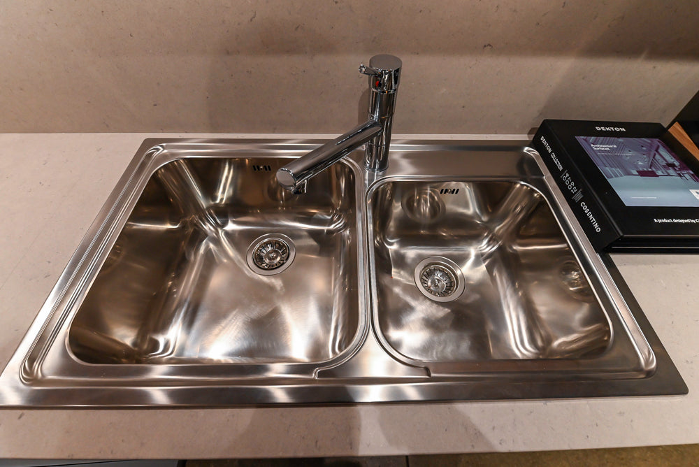 Lyon's Modern White and Natural Wood Toned Kitchenette with Silestone Countertops