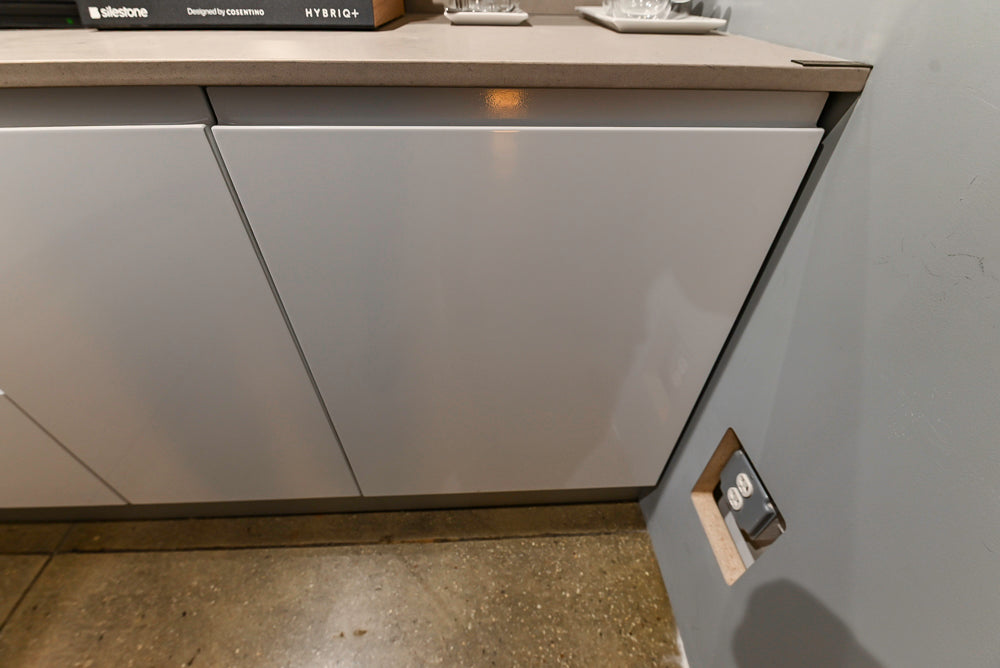 Lyon's Modern White and Natural Wood Toned Kitchenette with Silestone Countertops