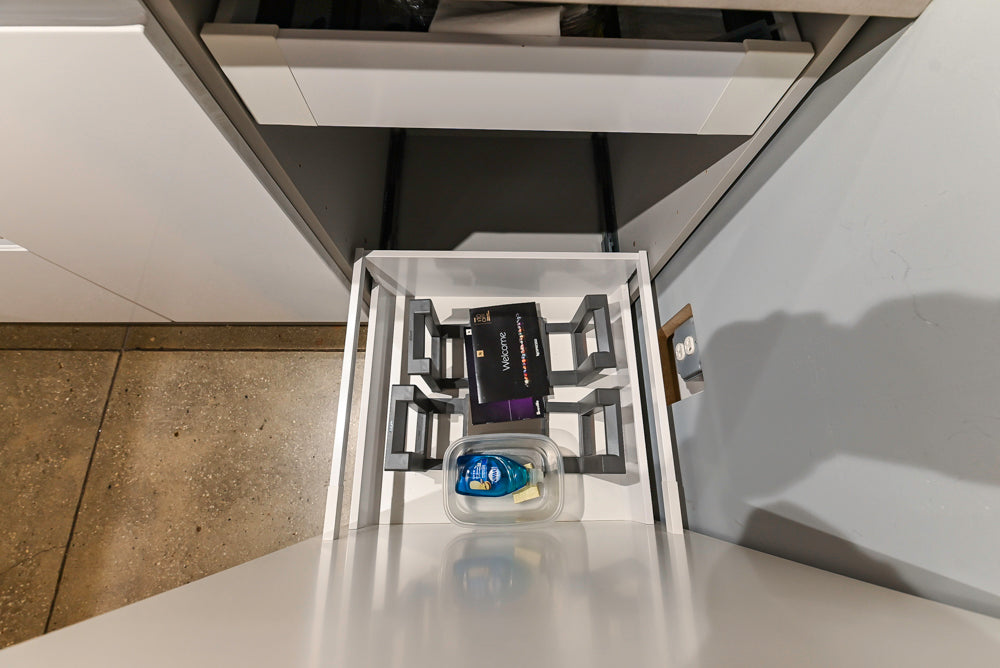 Lyon's Modern White and Natural Wood Toned Kitchenette with Silestone Countertops