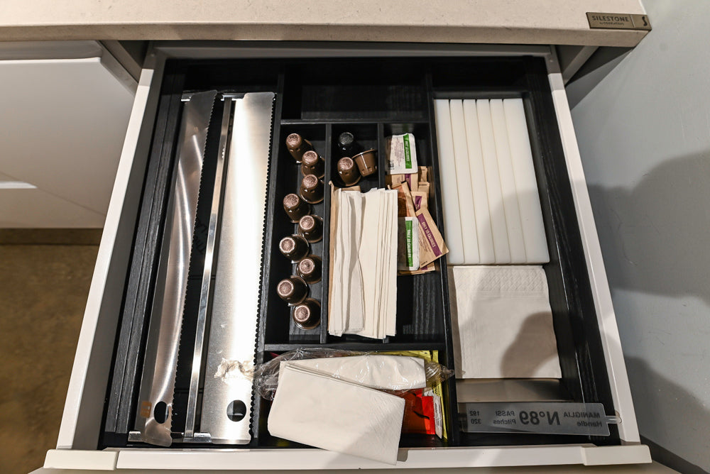 Lyon's Modern White and Natural Wood Toned Kitchenette with Silestone Countertops