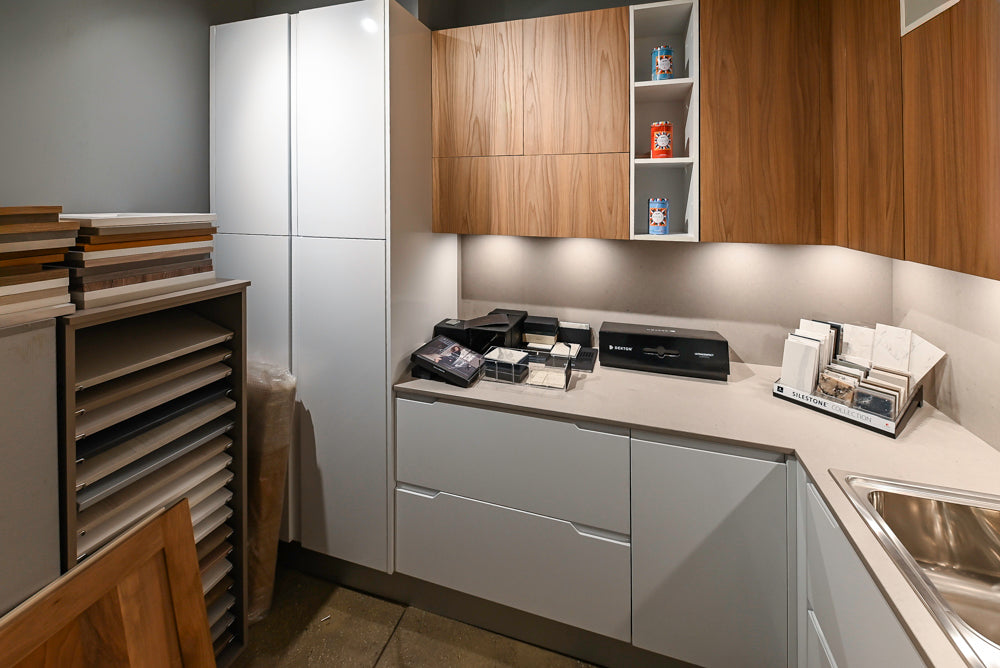Lyon's Modern White and Natural Wood Toned Kitchenette with Silestone Countertops