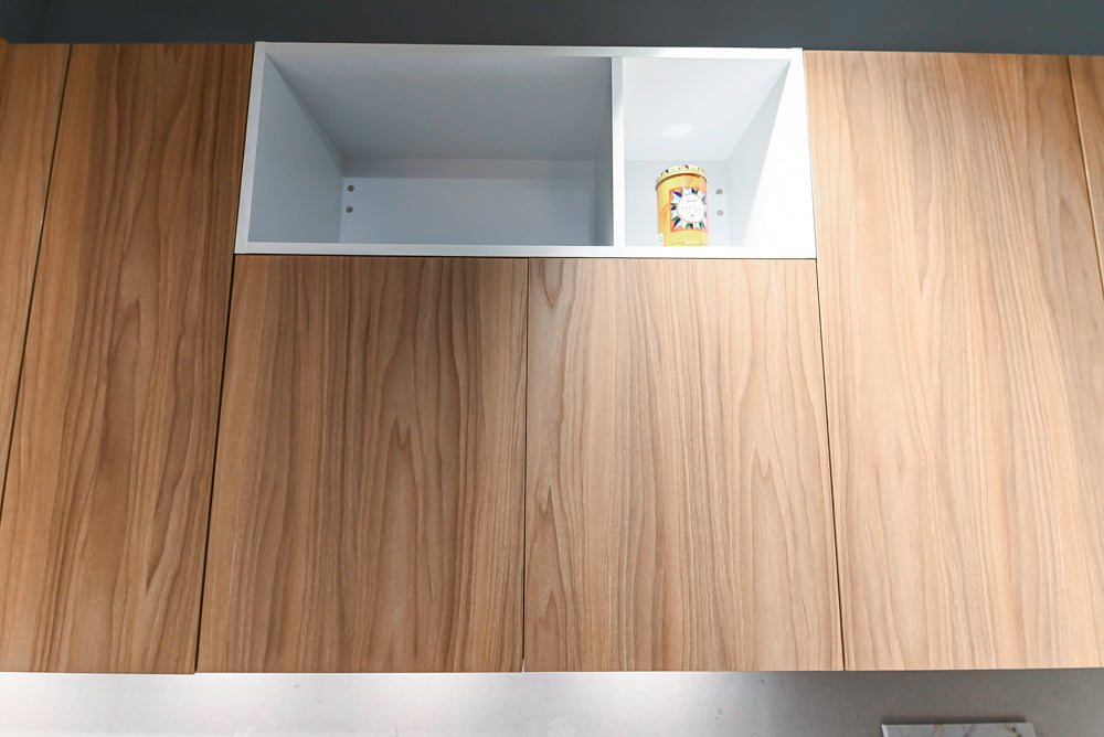 Lyon's Modern White and Natural Wood Toned Kitchenette with Silestone Countertops