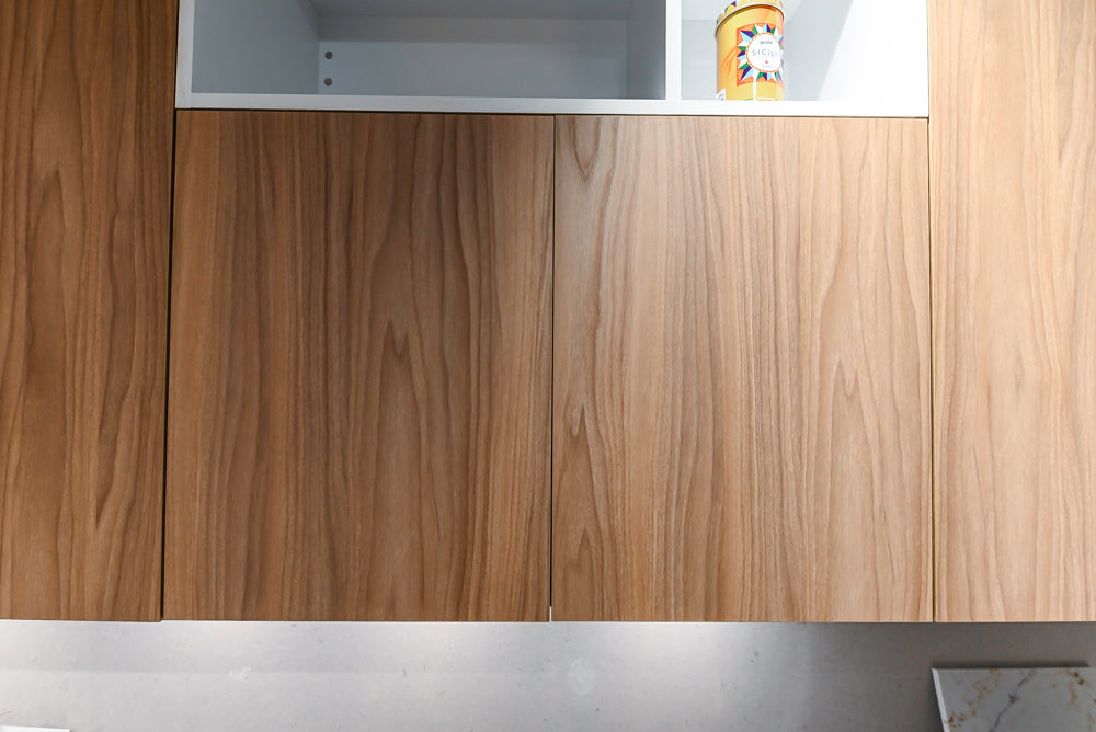 Lyon's Modern White and Natural Wood Toned Kitchenette with Silestone Countertops
