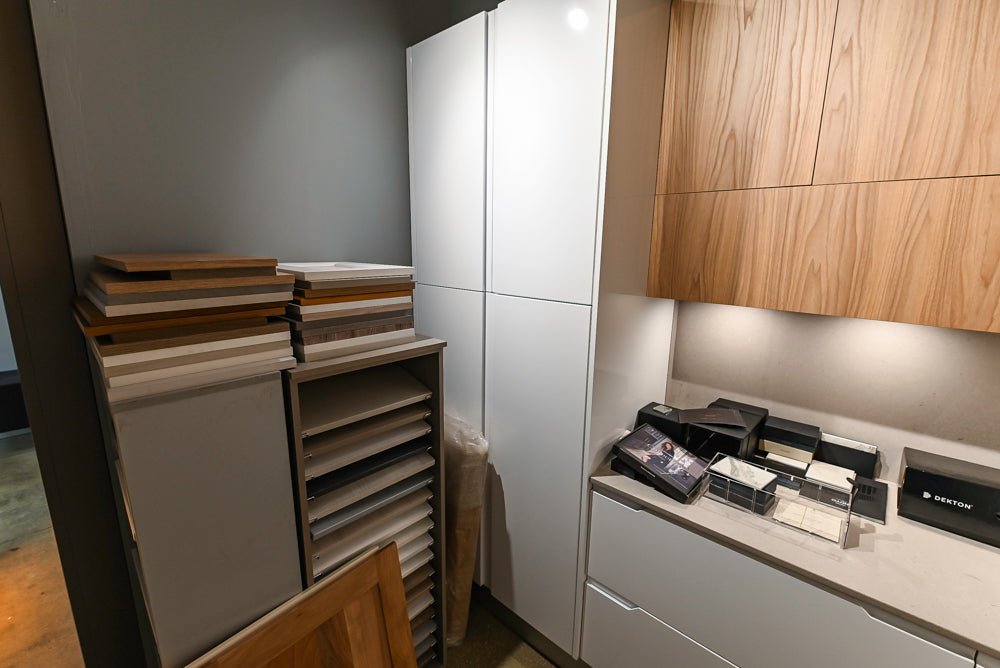 Lyon's Modern White and Natural Wood Toned Kitchenette with Silestone Countertops