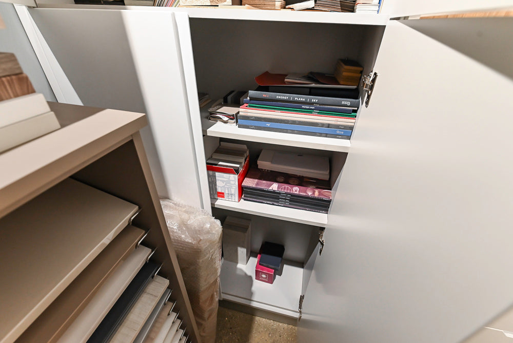 Lyon's Modern White and Natural Wood Toned Kitchenette with Silestone Countertops