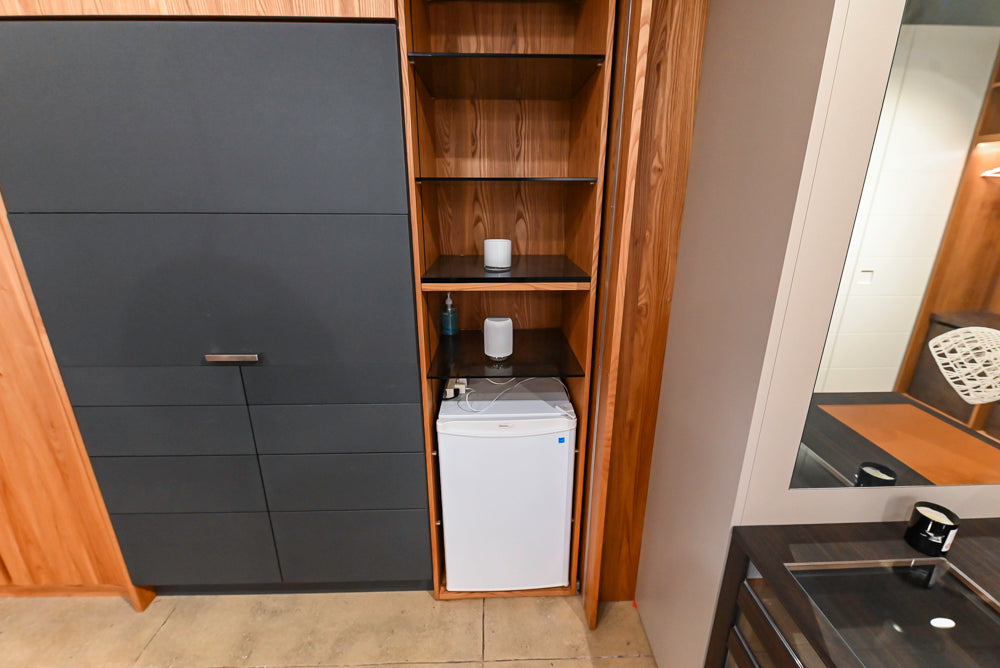 Modern Natural Wood Toned Hideaway Door Pantry