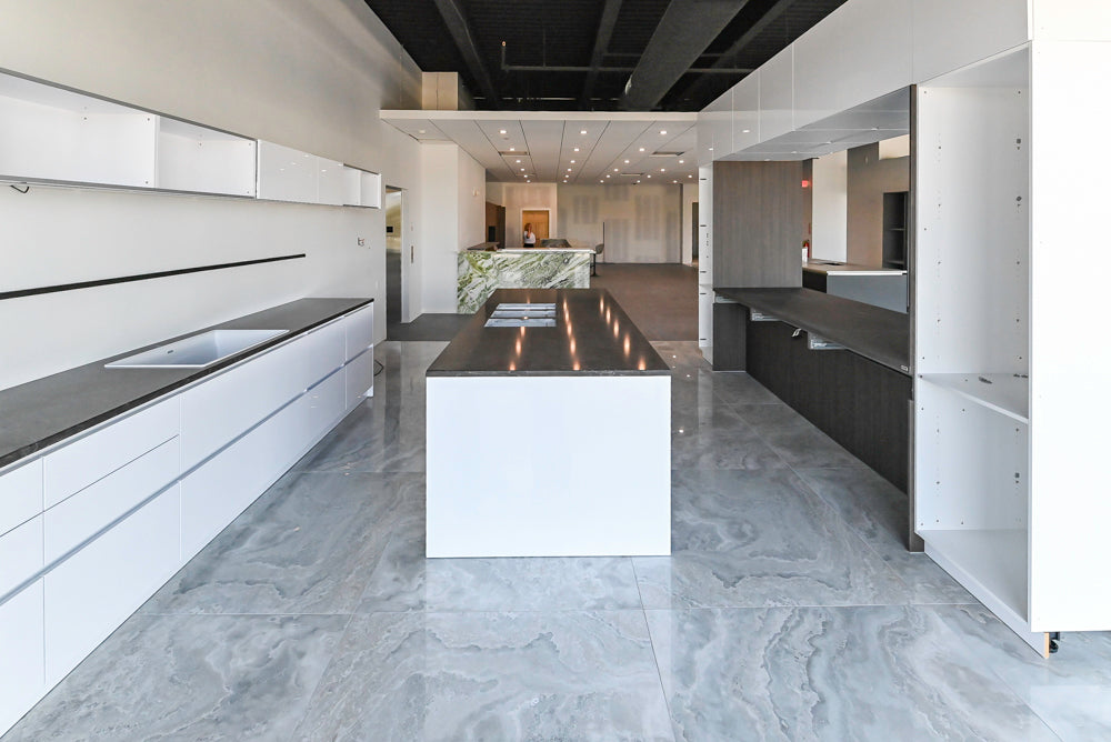 Häcker Modern Glossy White Kitchen with Island and Black Quartz Countertop