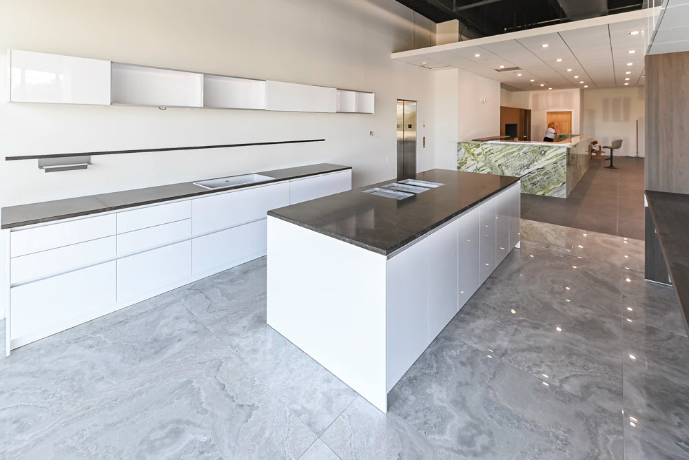 Häcker Modern Glossy White Kitchen with Island and Black Quartz Countertop