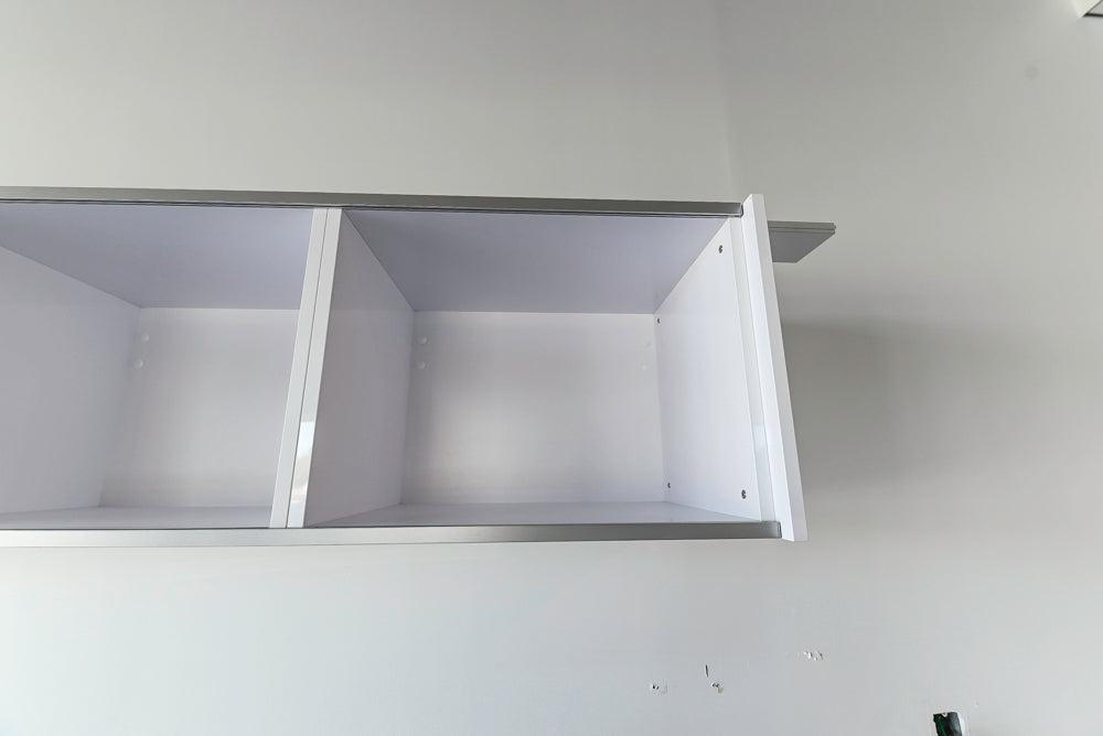 Häcker Modern Glossy White Kitchen with Island and Black Quartz Countertop