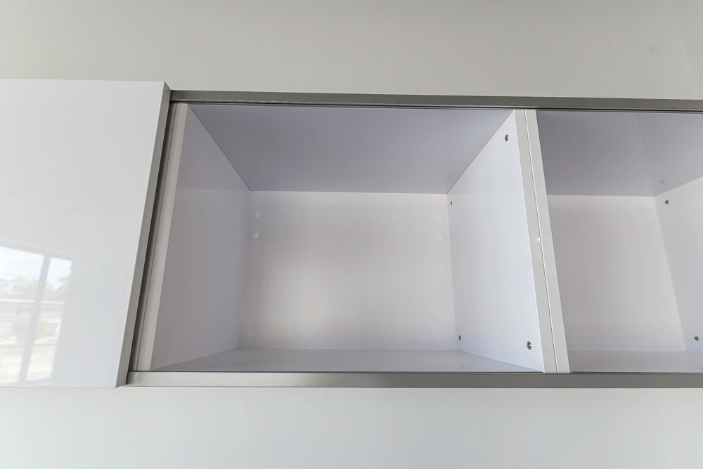 Häcker Modern Glossy White Kitchen with Island and Black Quartz Countertop