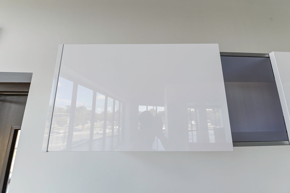 Häcker Modern Glossy White Kitchen with Island and Black Quartz Countertop