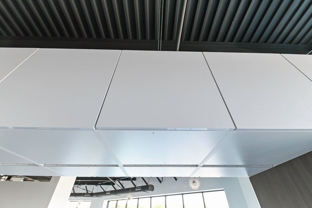 Häcker Modern Glossy White Kitchen with Island and Black Quartz Countertop