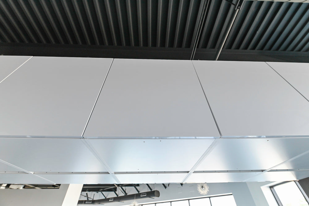 Häcker Modern Glossy White Kitchen with Island and Black Quartz Countertop