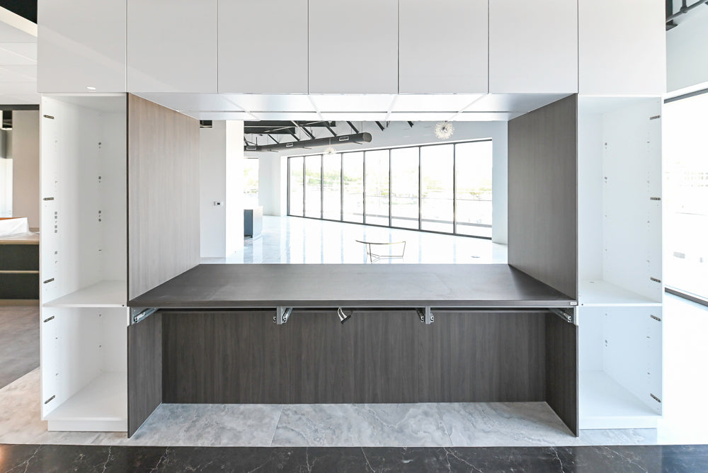 Häcker Modern Glossy White Kitchen with Island and Black Quartz Countertop