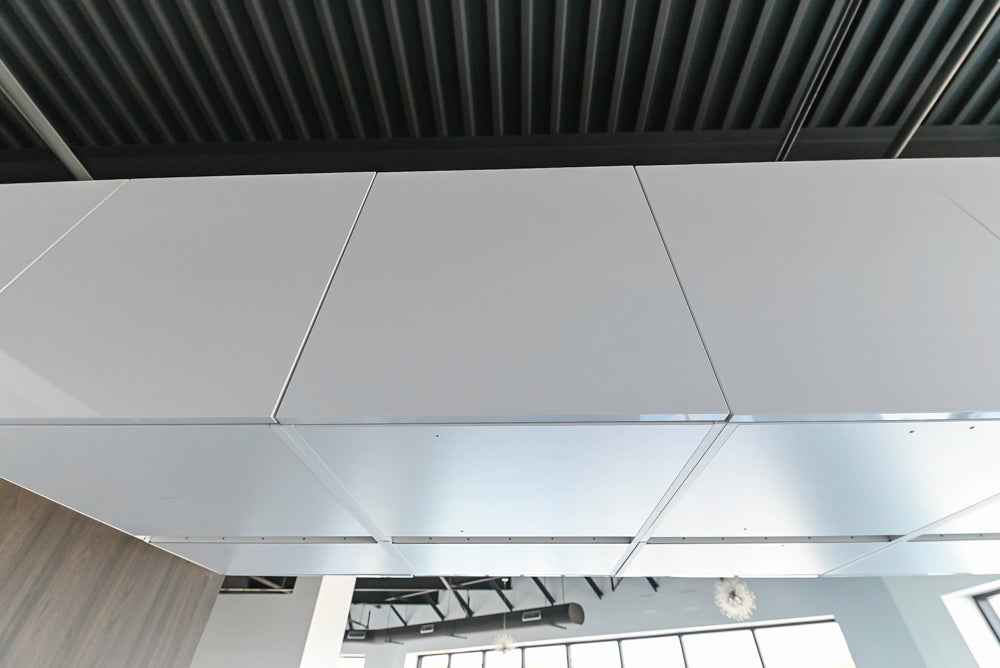 Häcker Modern Glossy White Kitchen with Island and Black Quartz Countertop